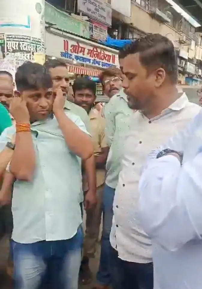 auto driver beaten by shivsena